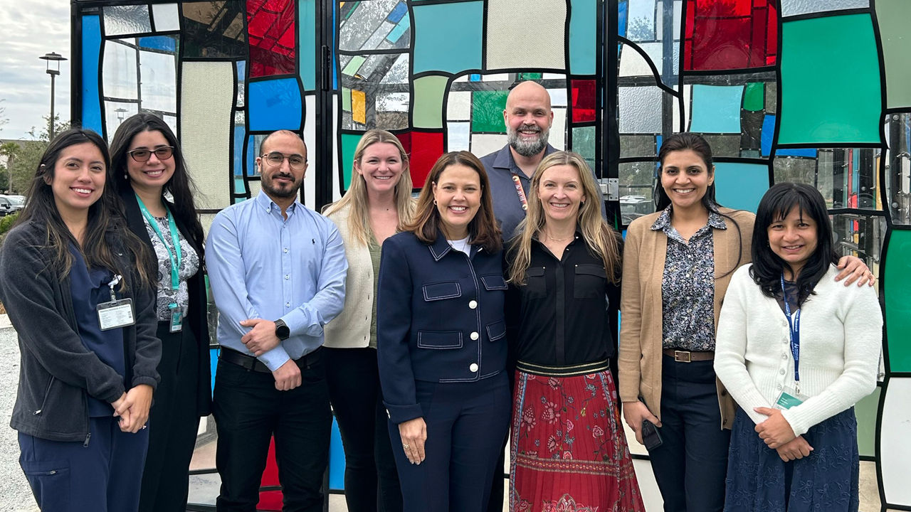 BMAP team standing in front of stain glass
