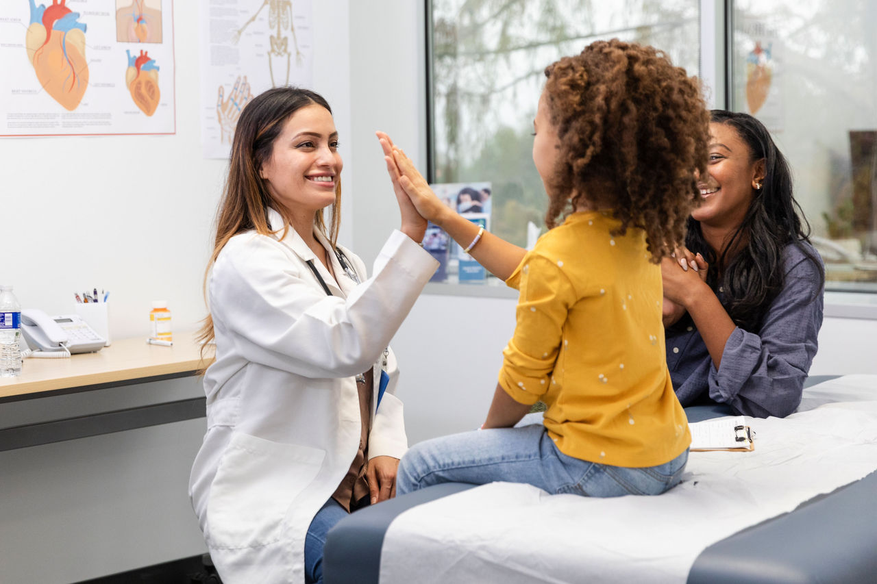 patient high fives doctor 