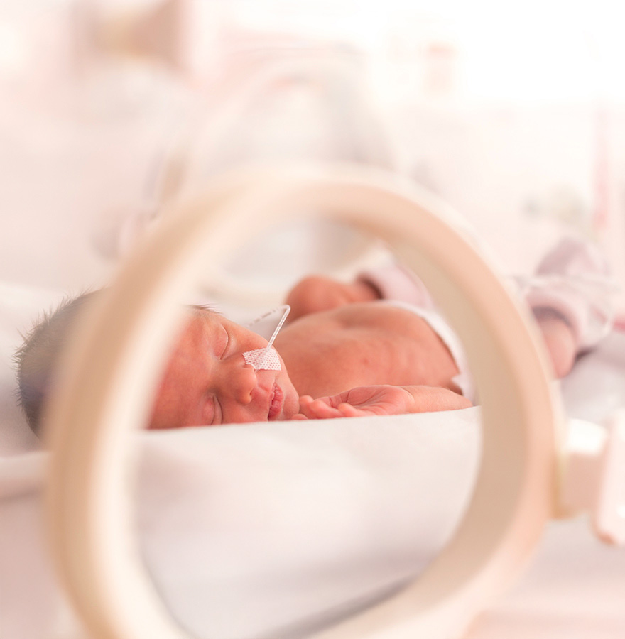 NICU baby in an incubator.