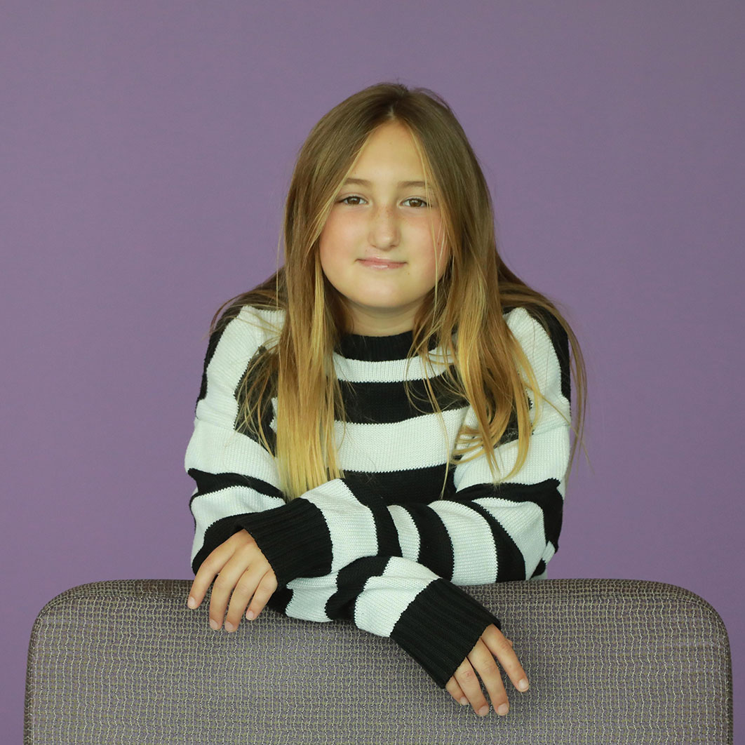 Plastic Surgery patient girl standing by chair